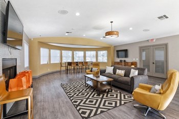 Resident lounge with couch and tv - Photo Gallery 5