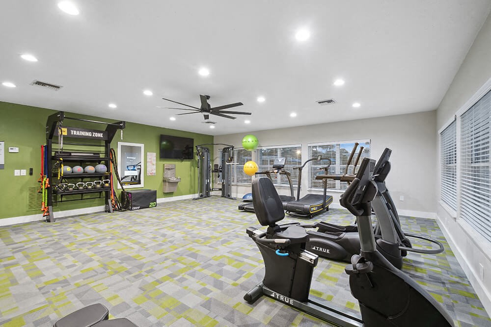Community Fitness Center with Equipment at Park at 7200 Apartments in Jacksonville, FL.