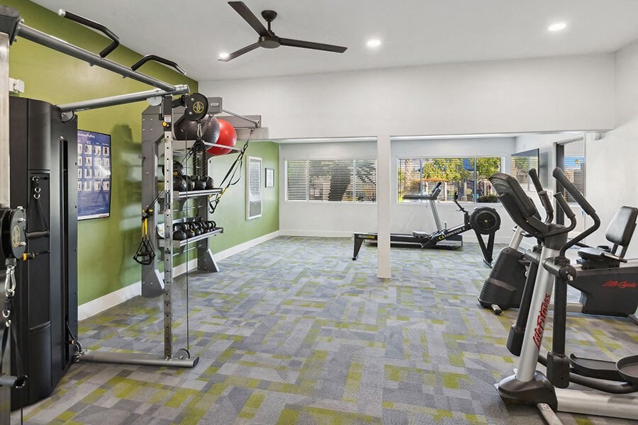 Community Fitness Center with Equipment at Lakeside Casitas Apartments located in Tucson, AZ.