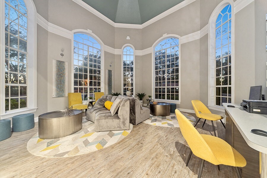 Community Clubhouse with Lounge Furniture at Vinings at Hunter's Green Apartments in Tampa, FL.