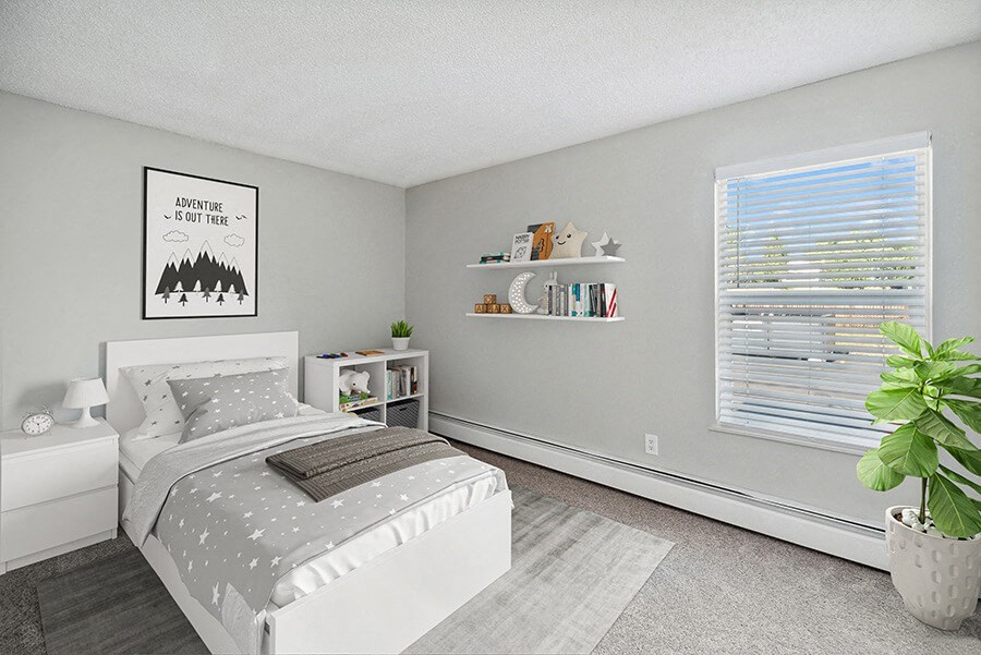 Model Bedroom with Carpet and Closet at Waterfront Apartments in Lakewood, CO.