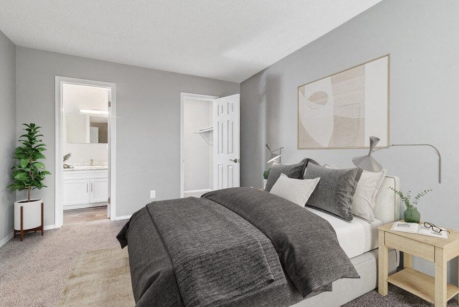 Model bedroom with queen bed