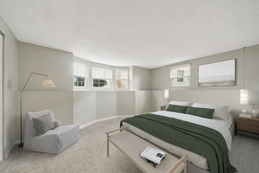 Model Bedroom with Carpet and Window Views at Meadows at Marlborough Apartments located in Marlborough, MA.