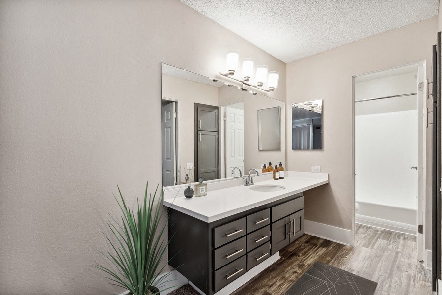 Model bathroom with separate toilet and tub