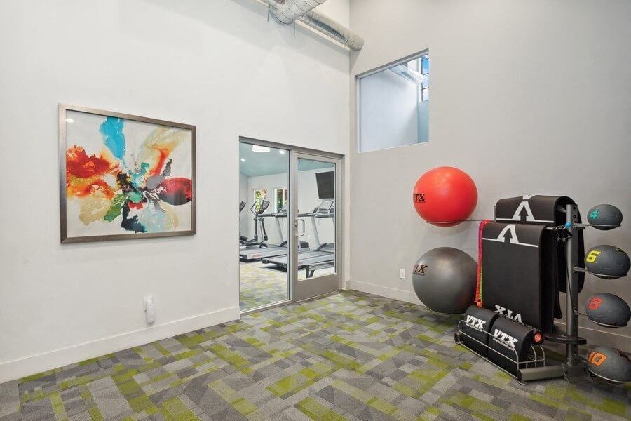 Community Fitness Center with Equipment at Creek 2645 Apartments in Sacramento, CA.