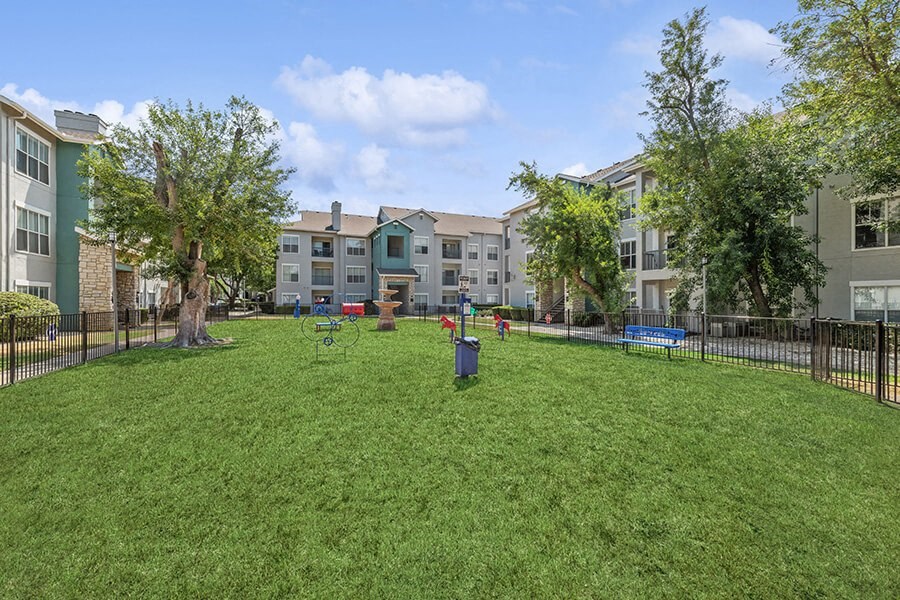 Community Dog Park with Agility Equipment at Essence Apartments in Dallas, TX.