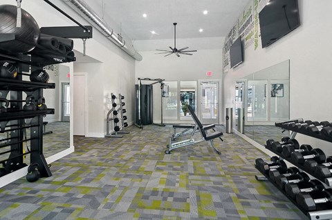 Community Fitness Center with Equipment at Overlook Apartments located in Salt Lake City, UT.