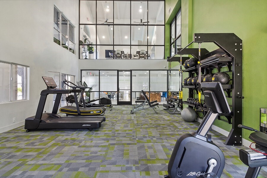 Community Fitness Center with Equipment at Meadow Ridge Apartments located in Las Vegas, NV.