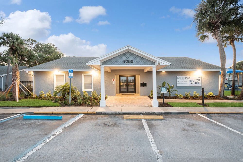 Exterior Community Building and Landscape at Park at 7200 Apartments in Jacksonville, FL.