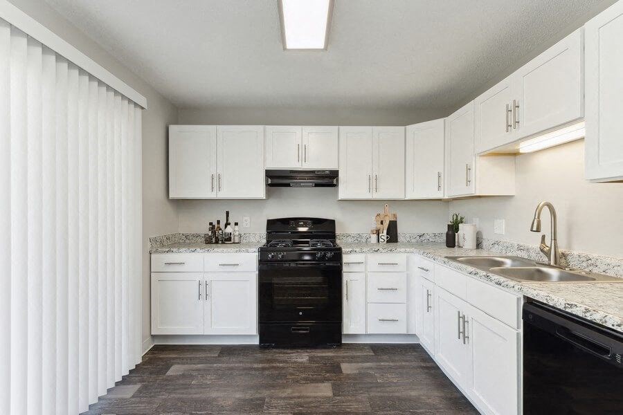 Model kitchen with updated white cabinets