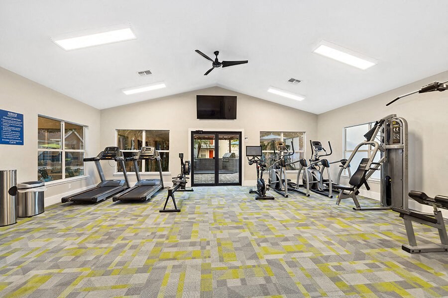 Community Fitness Center with Equipment at Retreat at Crosstown Apartments in Riverview, FL.