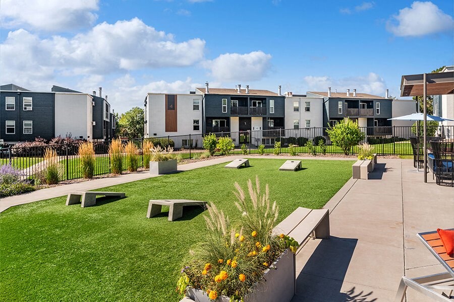 Outdoor Corn Hole Area at Waterfront Apartments in Lakewood, CO.