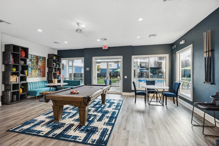 Game room with billiards table at Park West Apartments in Houston, Texas