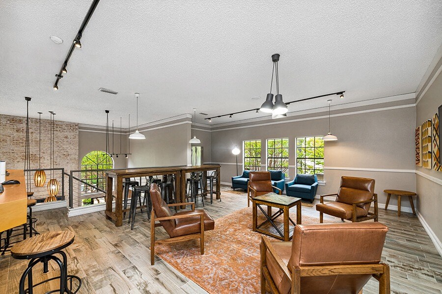 Community Clubhouse Upstairs Area with Lounge Furniture at Dallas North Park Apartments in Dallas, TX.