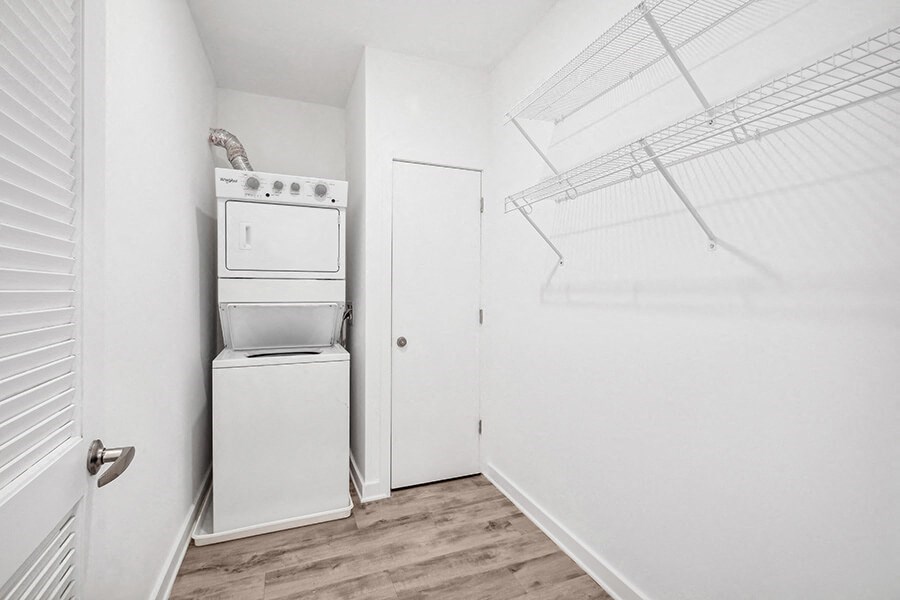 Model Laundry Room with Washer & Dryer at Stella Apartments located in New Carrollton, MD.