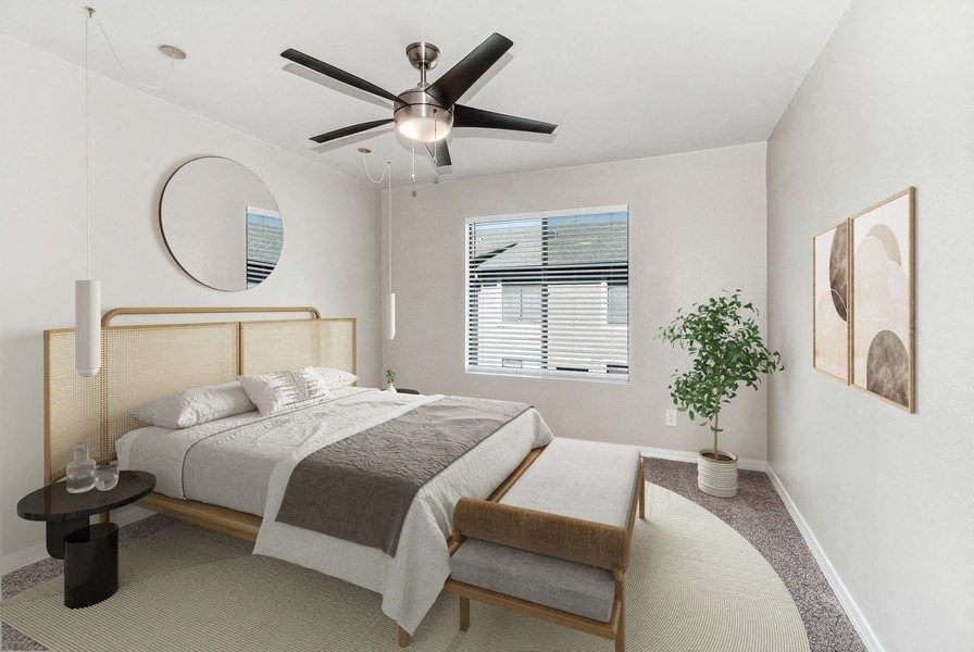 Model bedroom with ceiling fan