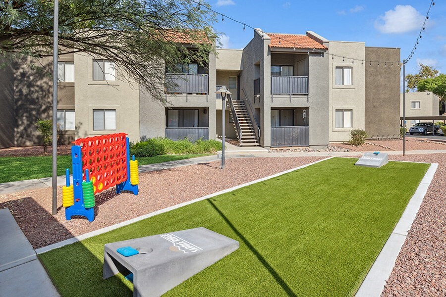 Outdoor Corn Hole Area at Saddle Ridge Apartments in Tucson, AZ.
