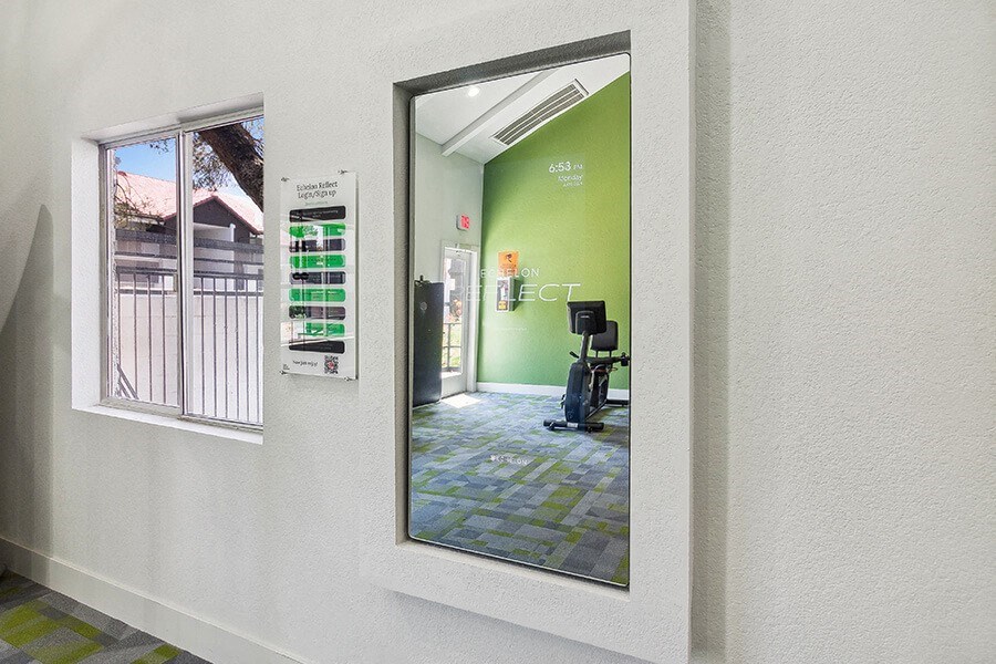 Community Fitness Center with Equipment at Meadow Ridge Apartments located in Las Vegas, NV.