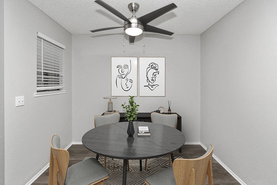 Model Dining Room with Wood-Style Flooring at The Meritage Apartments in Vallejo, CA.
