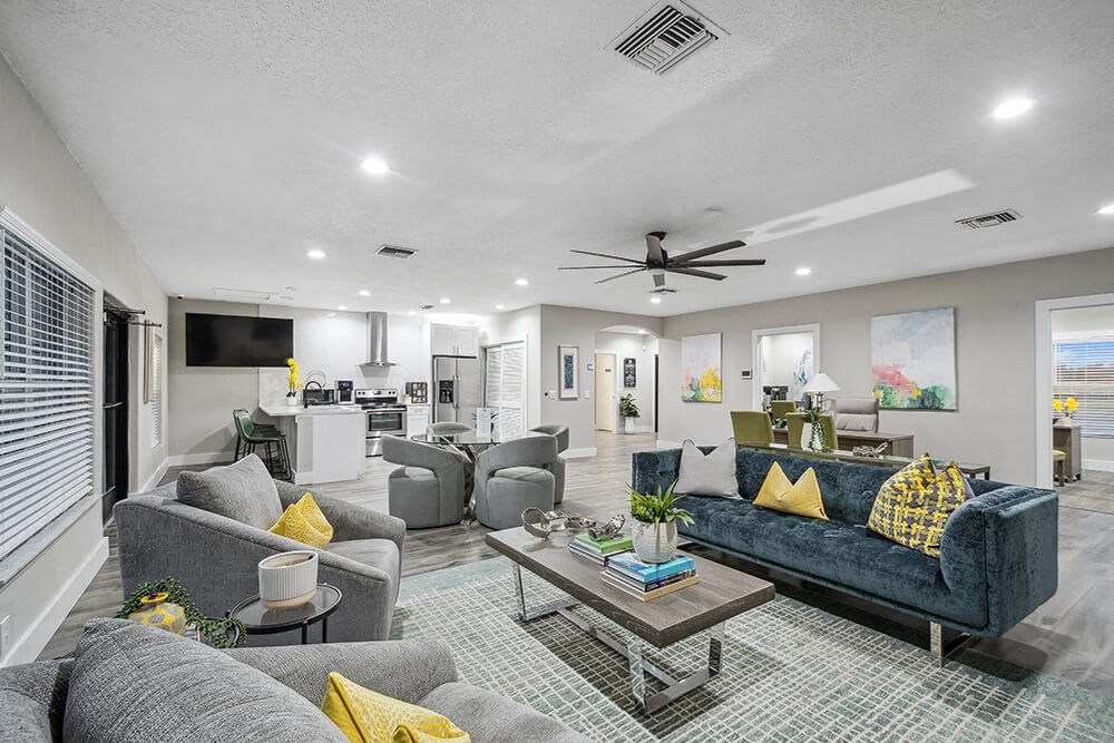 Community Clubhouse with Lounge Furniture and TV at Park at 7200 Apartments in Jacksonville, FL.