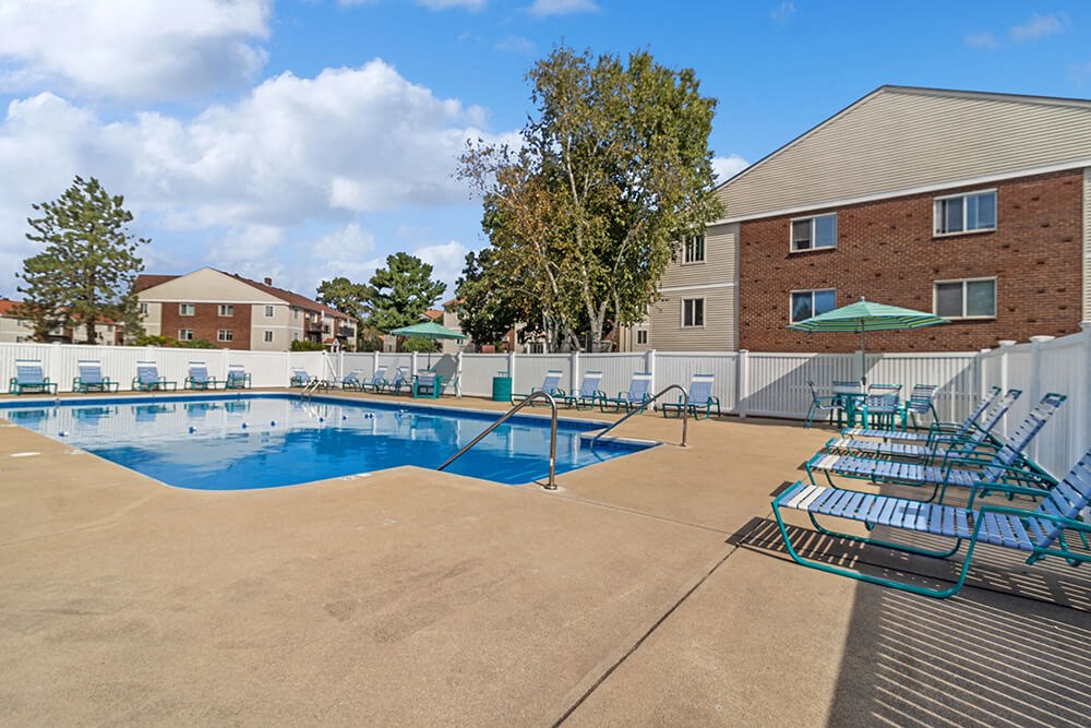 Pool and pool deck with lounge chairs