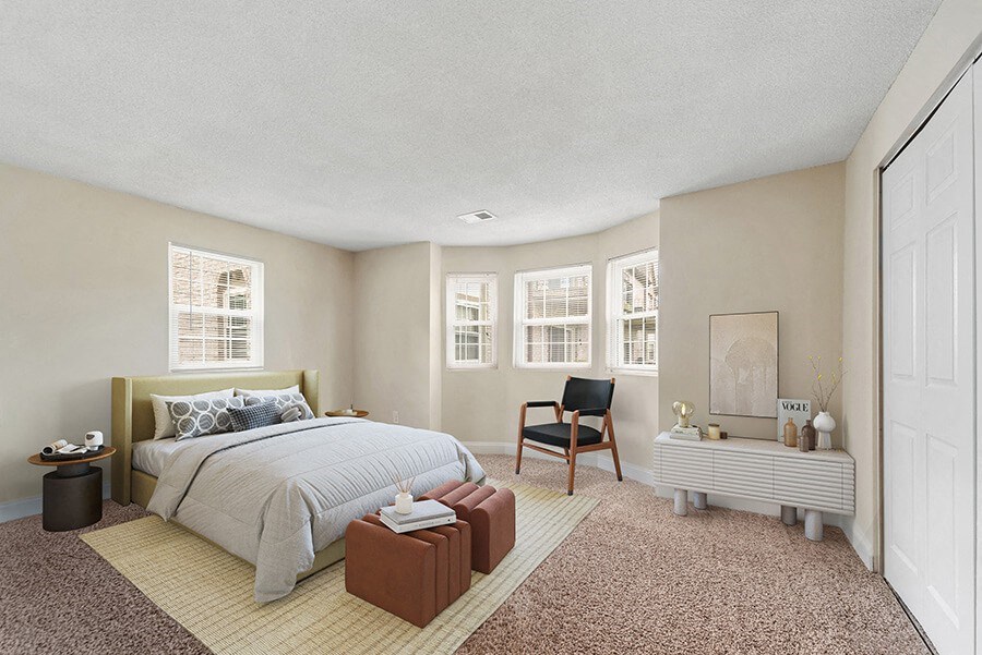 Model Bedroom with Carpet and Closet at Meadows at Marlborough Apartments in Boston, MA.