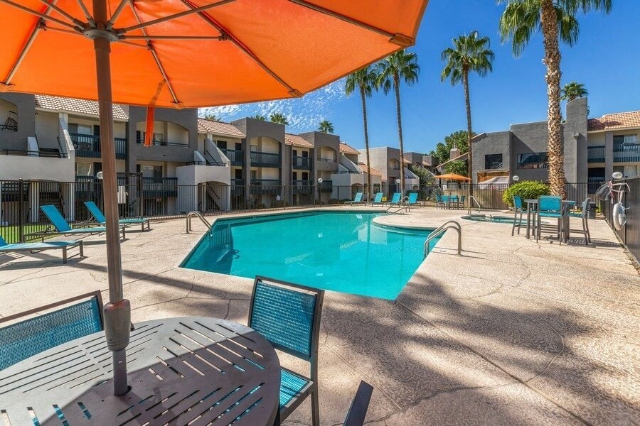 Poolside cabanas and palm trees