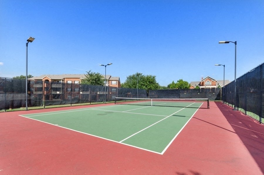 Fenced in Tennis Court with 4 night lighting posts