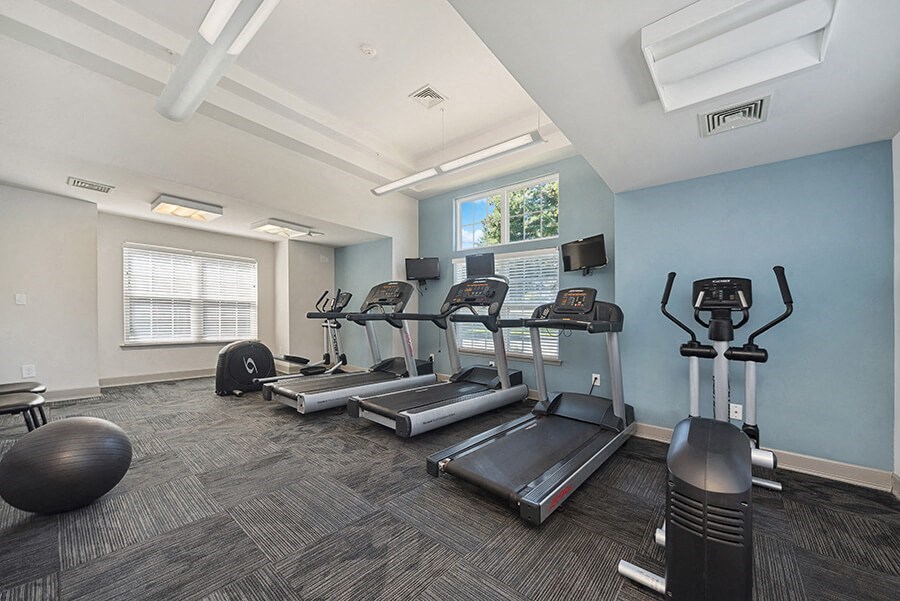 Community Fitness Center with Treadmills at The Commons at Haynes Farm Apartments in Boston, MA.