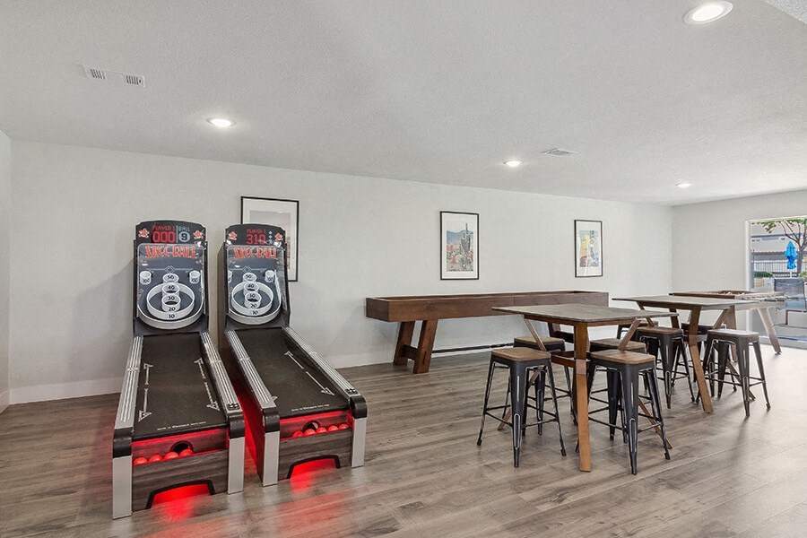 Community Clubhouse with Game Tables and Lounge Furniture at Loma Vista Apartments in Las Vegas, NV.