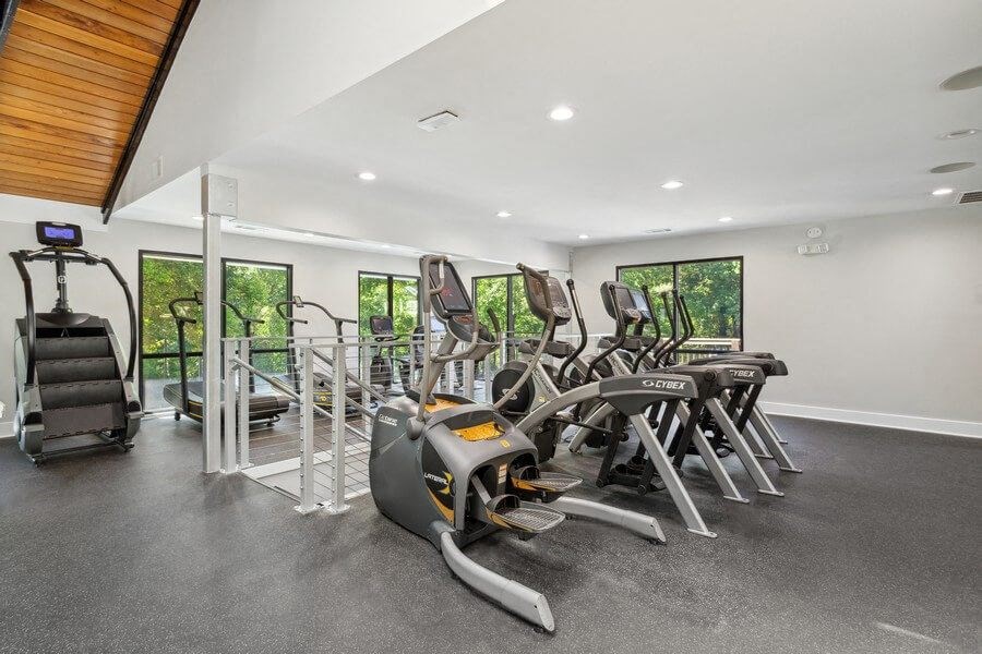 Community Fitness Center with Equipment at Dunwoody Village Apartments in Atlanta, GA.
