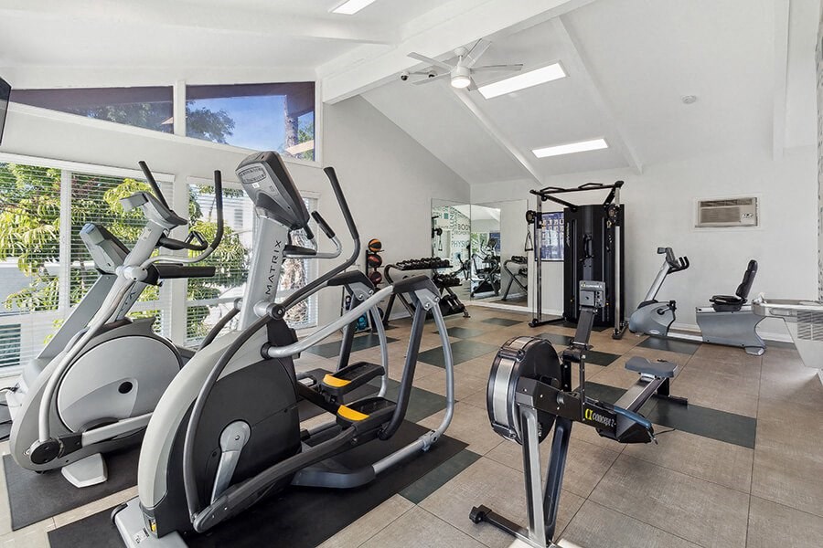 Community Fitness Center with Equipment at Colonnade at Fletcher Hills Apartments in El Cajon, CA.