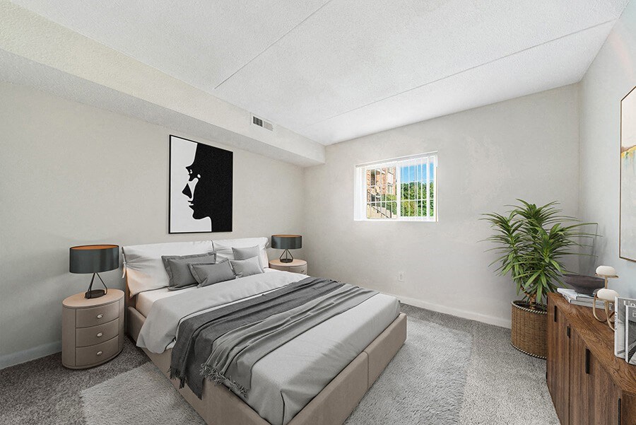 Model Bedroom with Carpet and Window View at Heights Marlborough Apartments in Boston, MA.