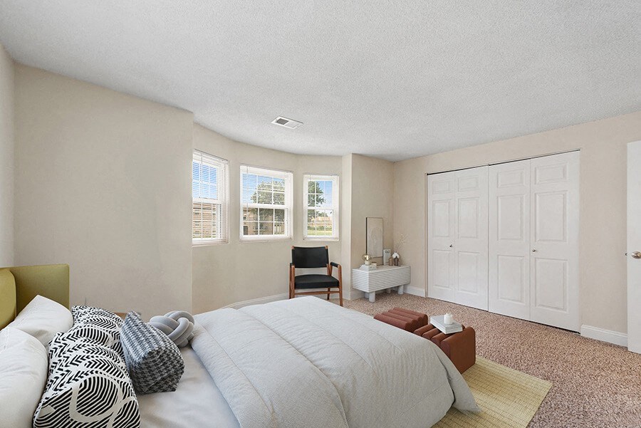 Model Bedroom with Carpet and Closet at Meadows at Marlborough Apartments in Boston, MA.