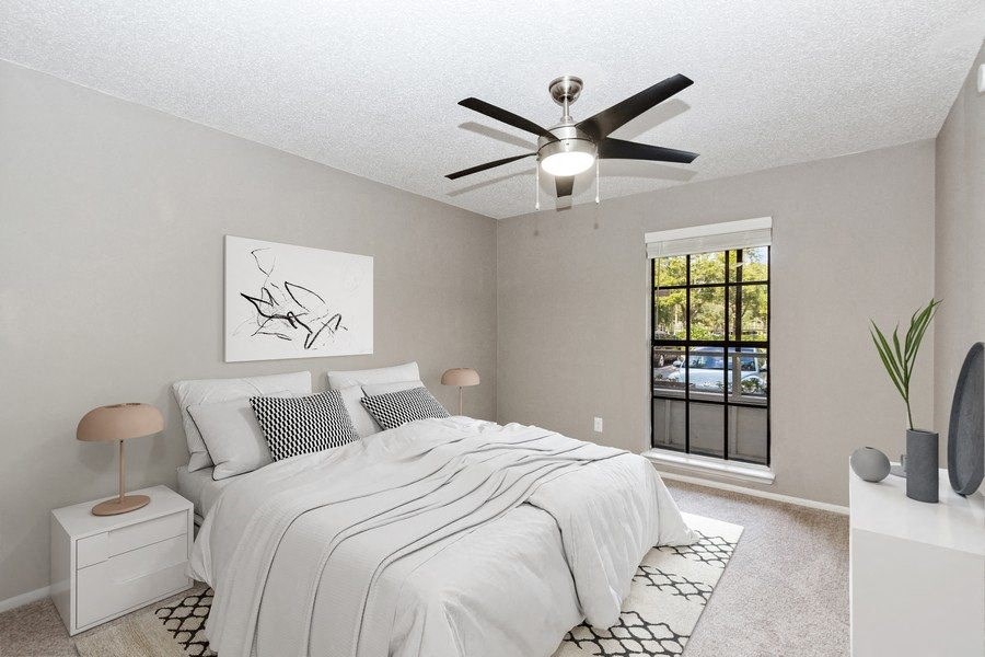 Model bedroom showcasing renovated interiors