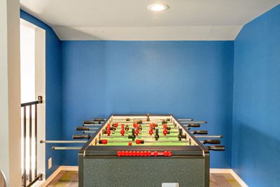 Clubhouse game area with foozetable
