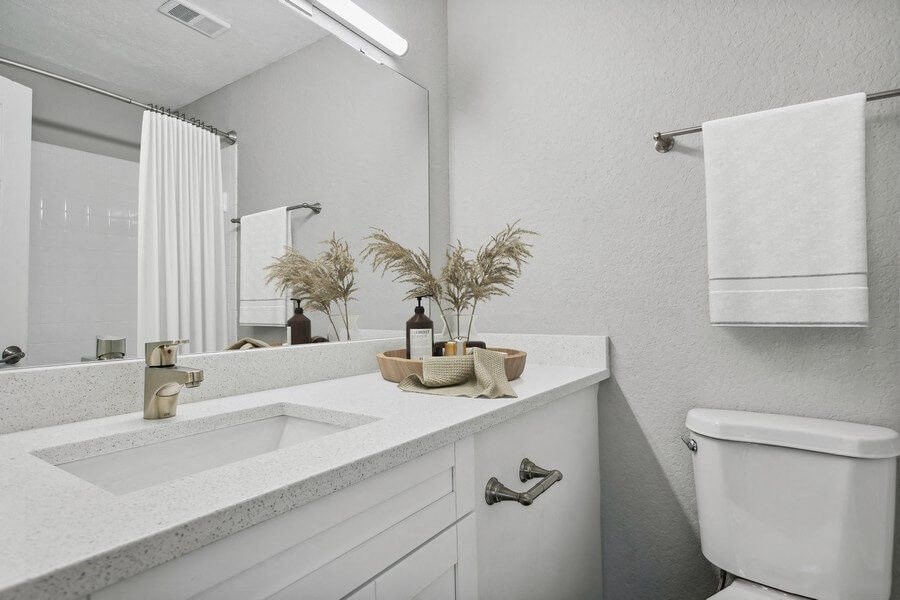 Model bathroom with white vanity