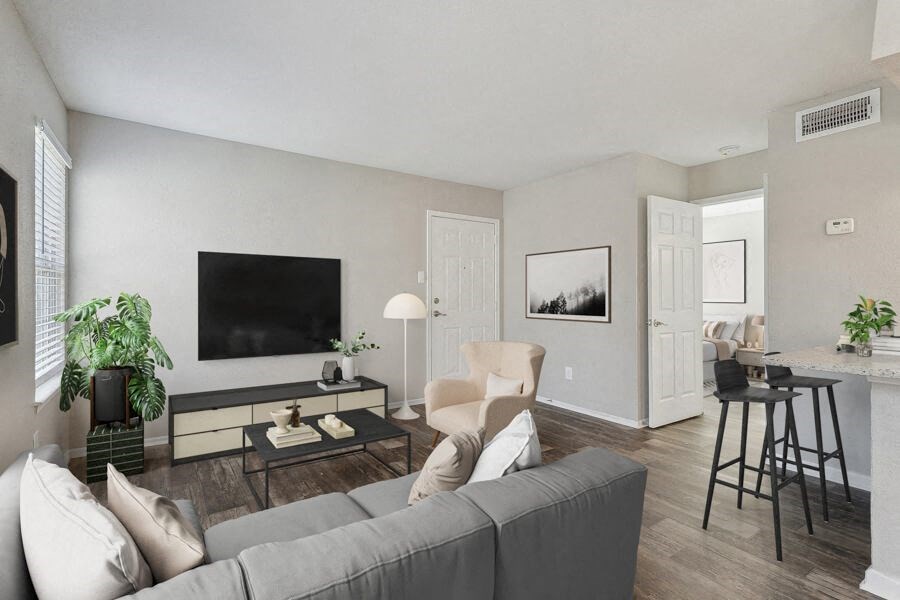 a living room with a couch and a television