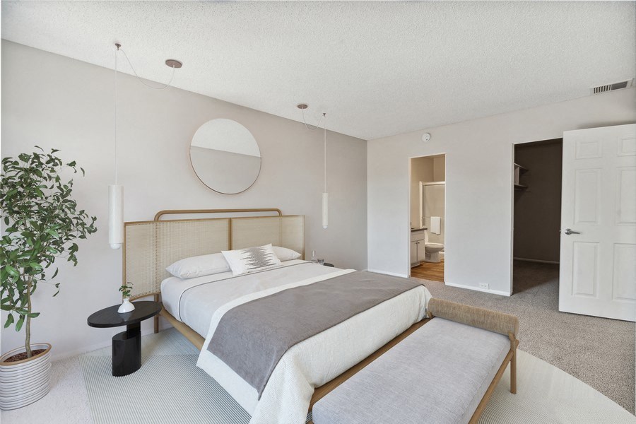 Model bedroom with attached bathroom