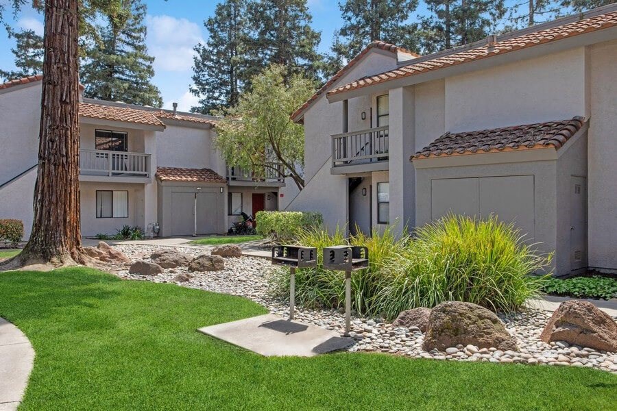 Exterior Community Building and Landscape at Creek 2645 Apartments in Sacramento, CA.