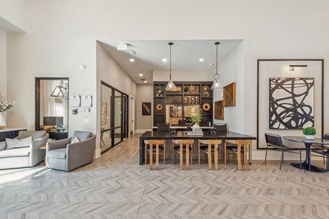 Community Clubhouse and Leasing Office Area at Alta 3Eighty Apartments located in Aubrey, TX.