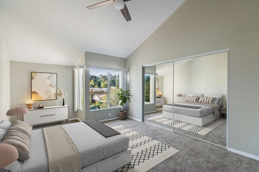 Model bedroom with large windows