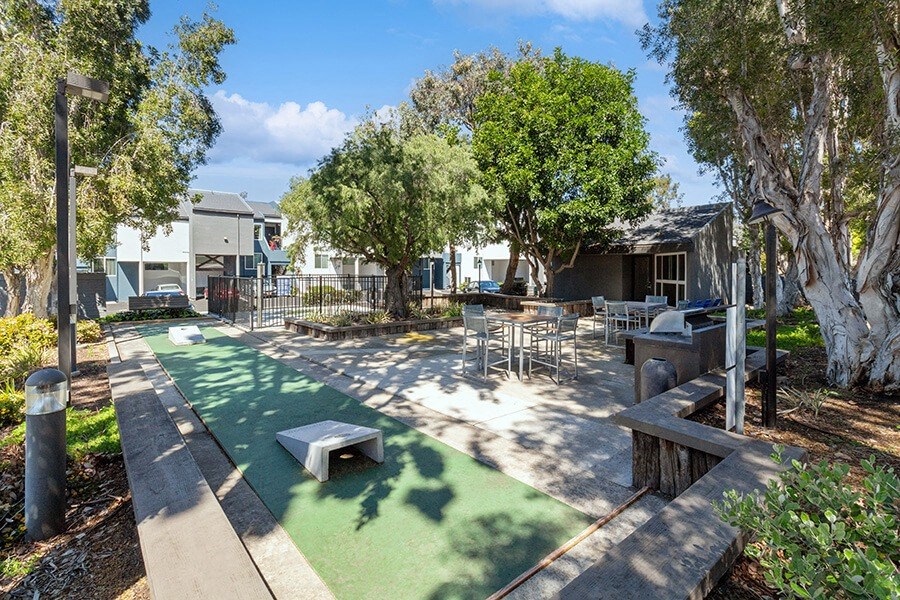 Outdoor Corn Hole Area at Colonnade at Fletcher Hills Apartments in El Cajon, CA.