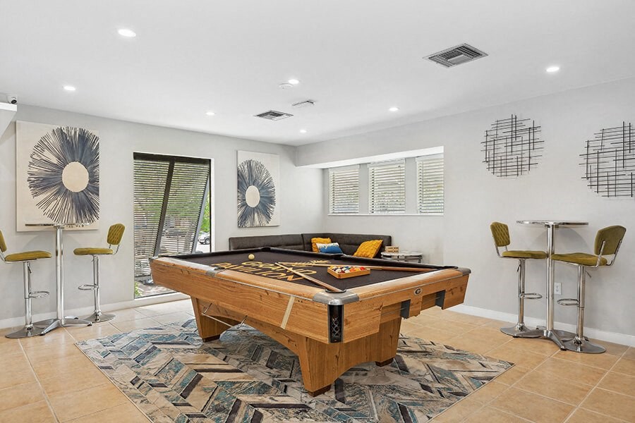 Community Clubhouse Game Tables at Grand Pavilion Apartments in Tampa, FL.