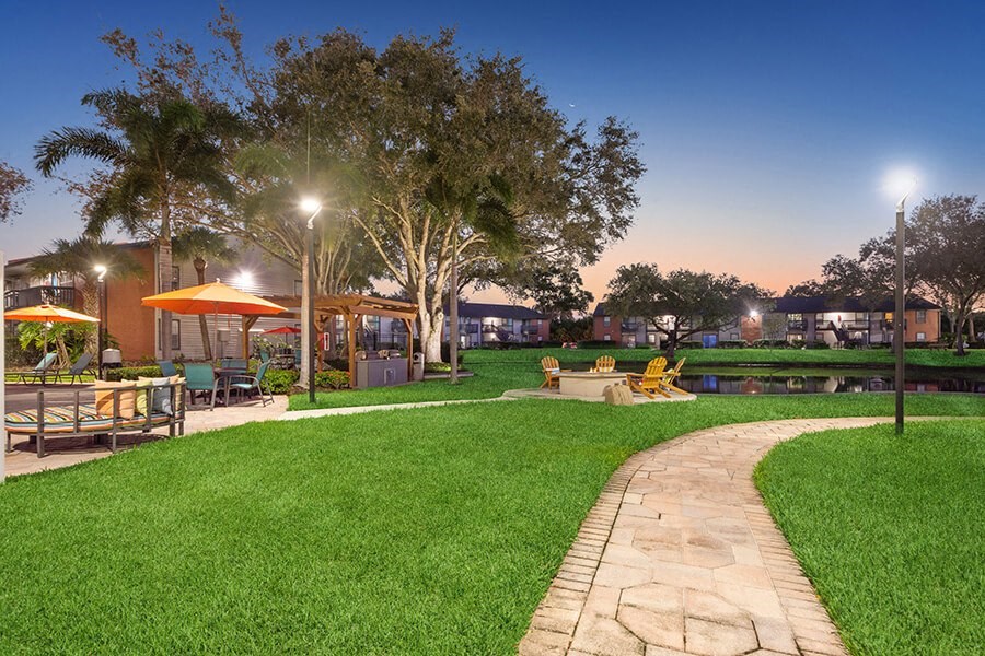 Community Pond and Walking Path at Bridges at Bayside Apartments in St. Petersburg, FL.