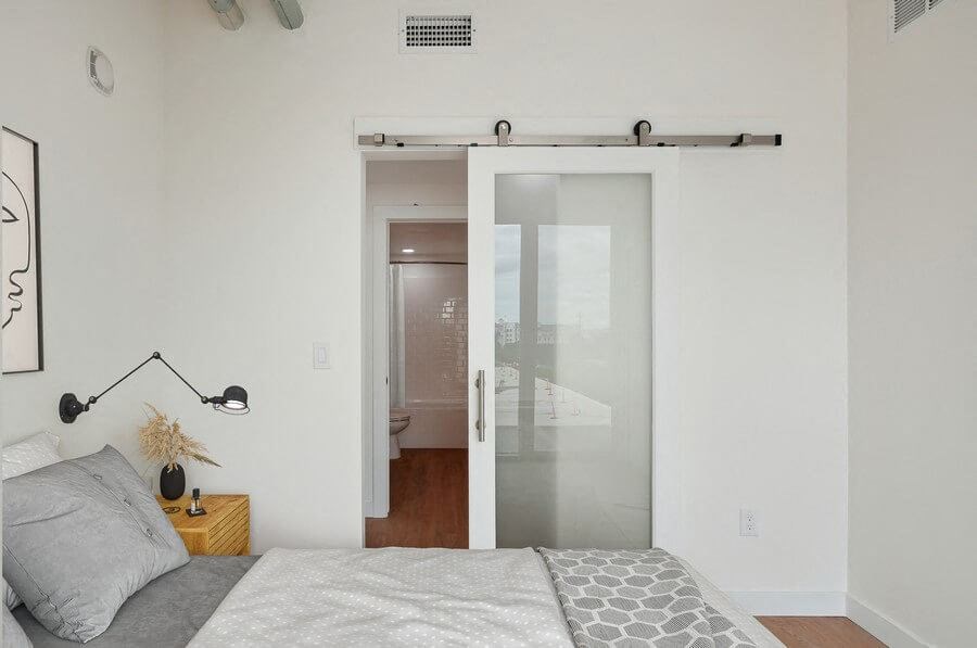 Model bedroom at The Register located in Post District Residences in downtown Salt Lake City, Utah