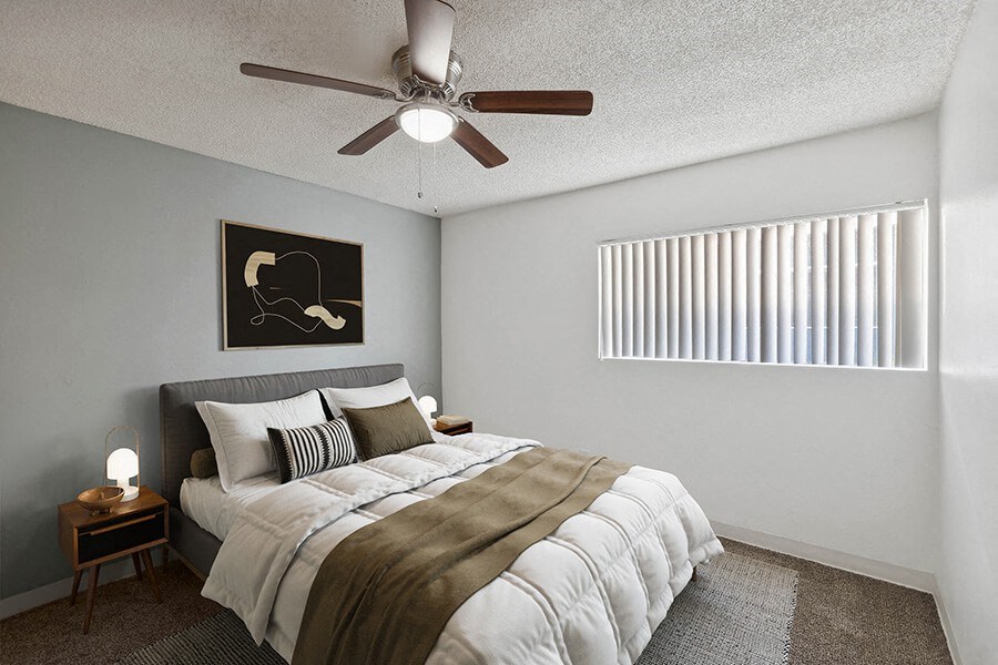 Model Bedroom with Carpet and Window View at Lakeside Casitas Apartments located in Tucson, AZ.
