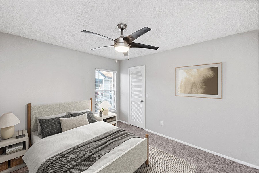 Model Bedroom with Carpet and Window View at Vue at Baymeadows Apartments in Jacksonville, FL.