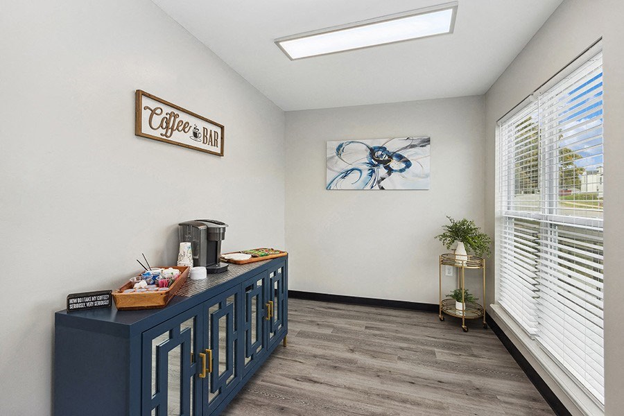 Community Clubhouse Coffee Bar Area with Coffee Supplies at Parc at Creekside Apartments in Kansas City, MO.