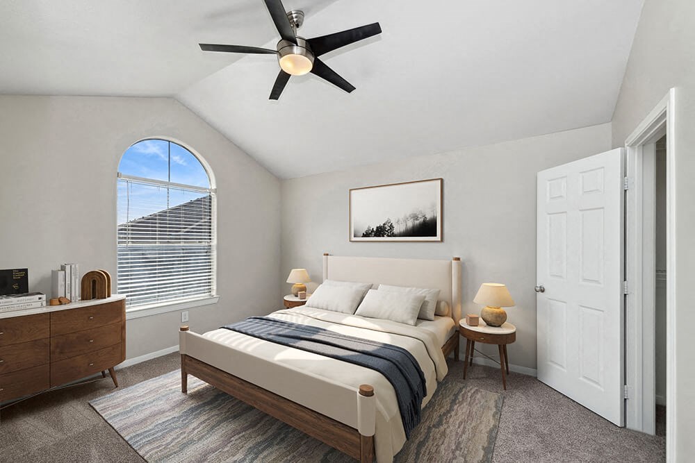Model Bedroom with Carpet and Walk In Closet at Hidden Creek Apartments in Lewisville, TX.